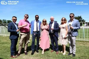 Happy owners and trainer before the action!
